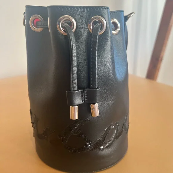 CHRISTIAN LOUBOUTIN
Marie Jane Black Leather Mini Bucket Bag - Picture 2 of 8